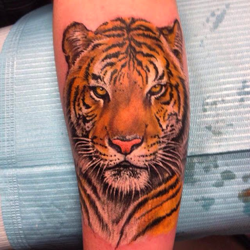 Explore breast cancer awareness tattoo ideas, creative tattoo ideas in Merrick, available at Wyld Chyld Tattoo