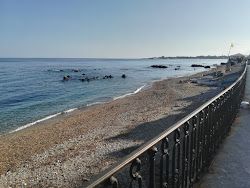 Foto di Spiaggia di Giardini Naxos sorretto da scogliere