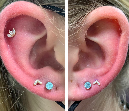 Explore cover up flower tattoo ideas, creative tattoo ideas in Powell, available at Elysium Body Enhancements