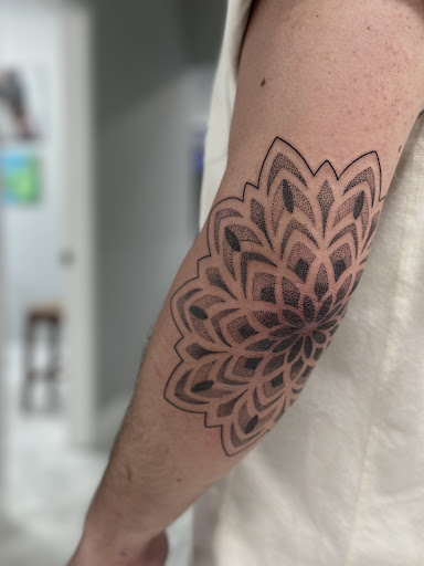 Explore down syndrome tattoo ideas, creative tattoo ideas in Prairieville, available at Nolana Tattoo & Piercing