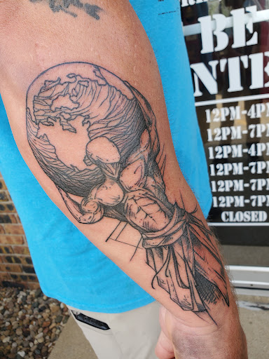 Explore small dove tattoo ideas, creative tattoo ideas in Peoria, available at Guerrilla Ink Tattoos