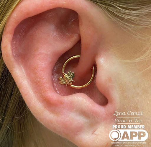 Explore tattoo ideas for a name cover up, creative tattoo ideas in Marietta, available at The Queen Bee Tattoo and Piercing Parlour