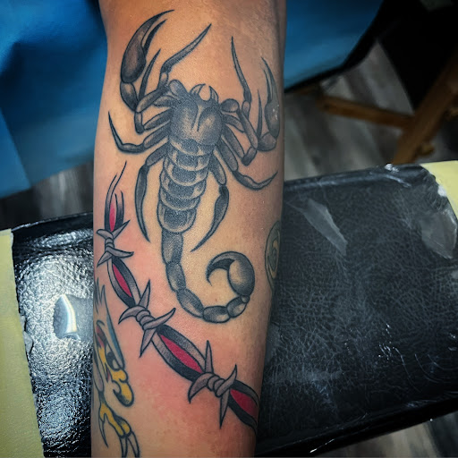Explore elbow tattoo ideas for men, creative tattoo ideas in Madera, available at Sea Wolf Tattoo