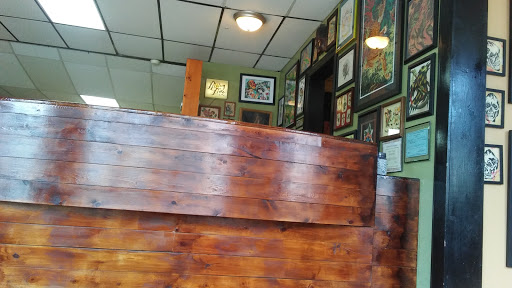 Find small sun tattoo ideas for your next unique tattoo in Newark at Rising Tide Tattoo Studio