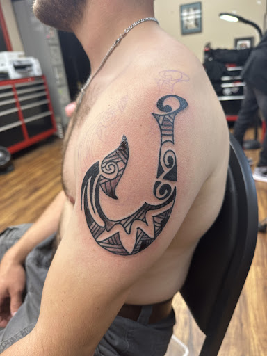 Find mens skull tattoo ideas for your next unique tattoo in Bryant at Goon Tattoo