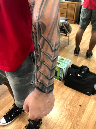 Explore tattoo ideas with kids names, creative tattoo ideas in Sarasota, available at SEVEN SINS Tattoo Studio