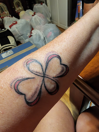 Explore family silhouette tattoo ideas, creative tattoo ideas in Erie, available at 76 Tattoo