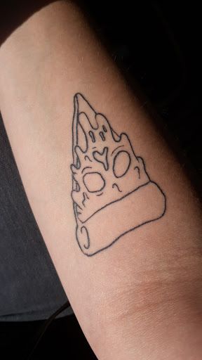 Find fruit tattoo ideas for your next unique tattoo in Knoxville at Archangel Custom Ink Tattoo & Piercing