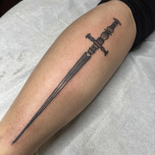 Explore tattoo flag ideas, creative tattoo ideas in Buffalo, available at True Gloom Tattoo Studio
