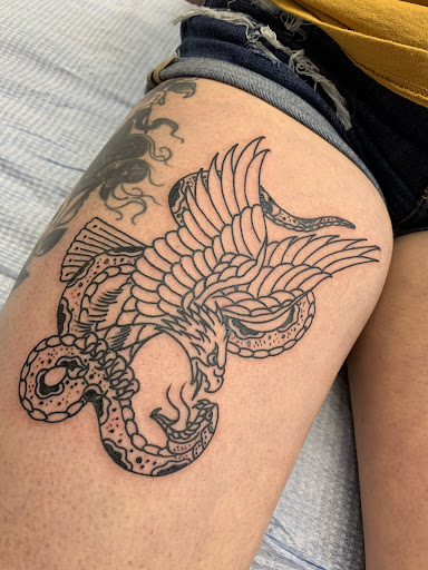 Explore women's ankle tattoo ideas, creative tattoo ideas in Grovetown, available at Triumph Tattoo Company