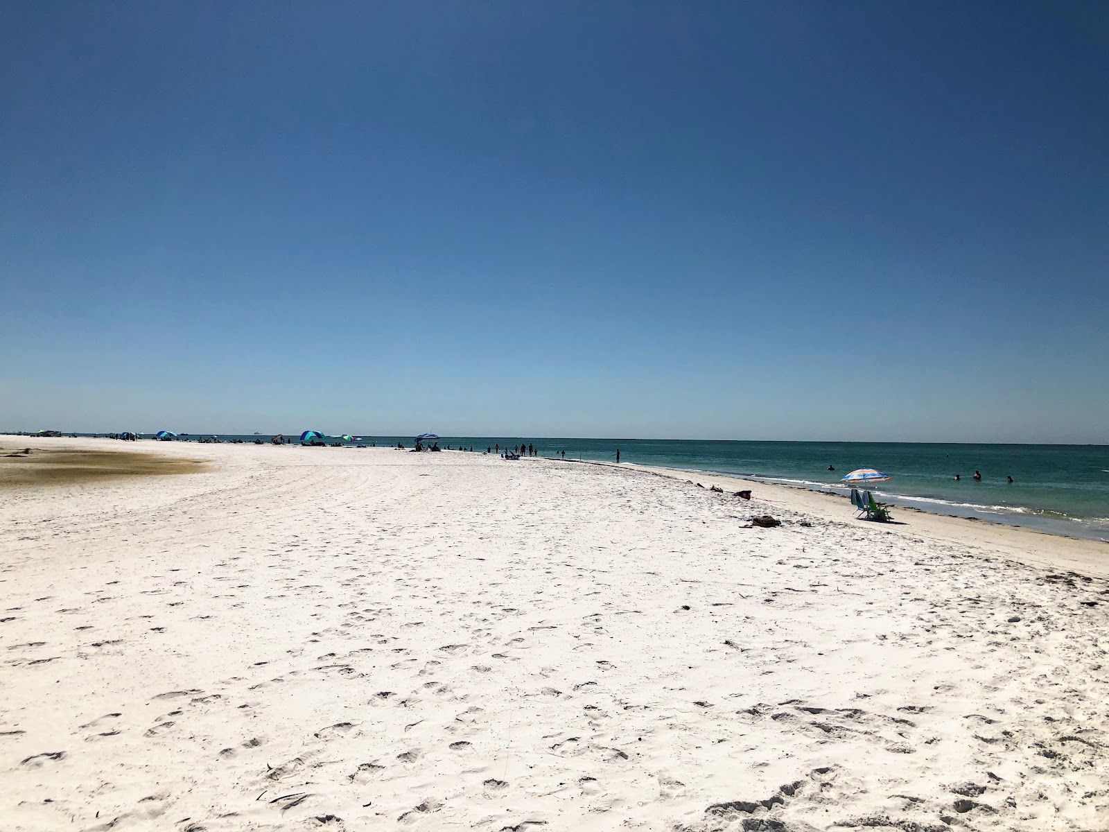 Photo of Bean Point beach and the settlement