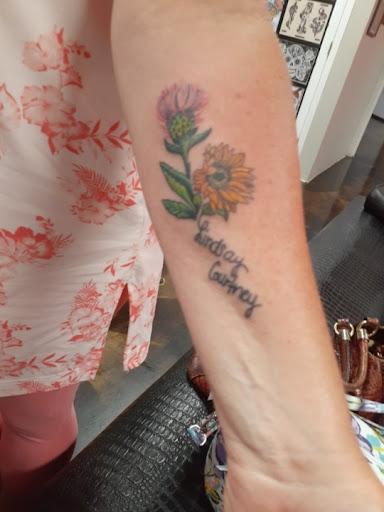 Explore leg tattoo idea for men, creative tattoo ideas in Morehead City, available at Diamond City Tattoo