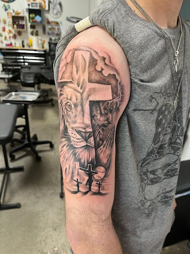 Explore leg tribal tattoo ideas, creative tattoo ideas in Dallas, available at Midgard Tattoo Company