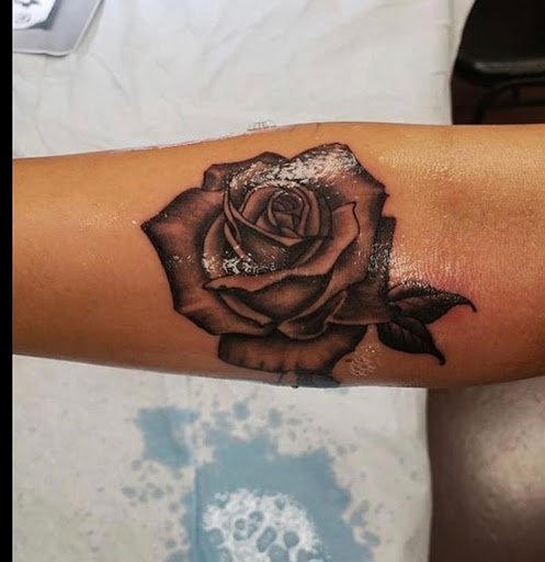 Explore hand skull tattoo ideas, creative tattoo ideas in Modesto, available at Dying Art Tattoo