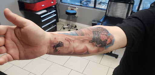 Explore happy tattoo ideas, creative tattoo ideas in Ocoee, available at Slaughterized Ink Tattoo and Piercing Studio