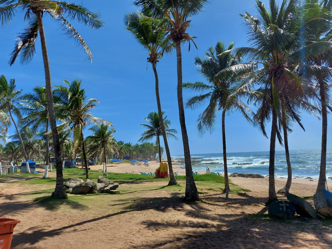 Praia Farol de Itapua'in fotoğrafı geniş bir kıyı şeridi ile birlikte