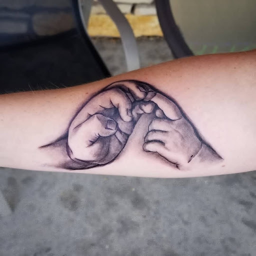 Explore black cat tattoo ideas, creative tattoo ideas in Roscoe, available at Elevated Ink Tattoo