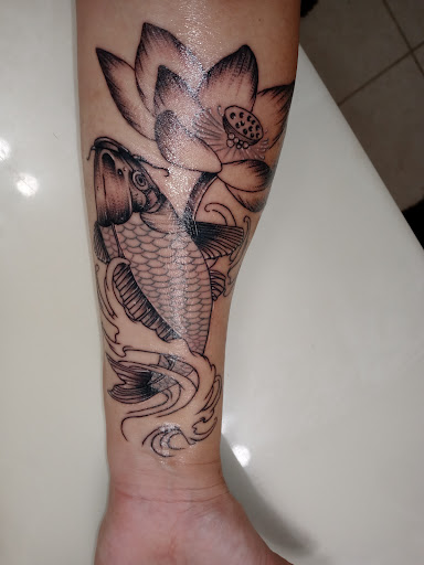 Explore initial finger tattoo ideas, creative tattoo ideas in Satellite Beach, available at Rocksteady Tattoo Company