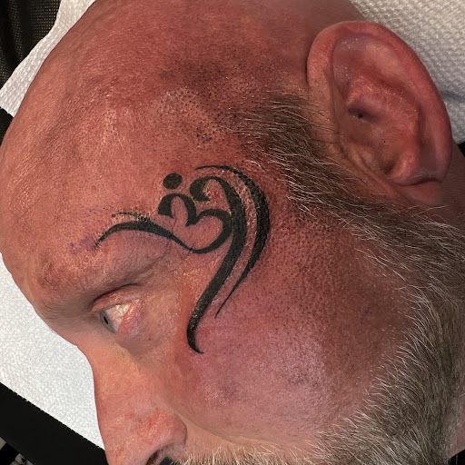 Explore smile tattoo ideas, creative tattoo ideas in Selbyville, available at INDEPENDENT TATTOO