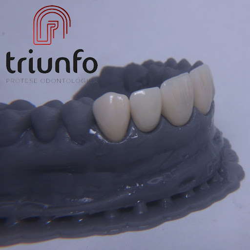 Logo da empresa - Triunfo Laboratório de Próteses Dentárias Odontológicas