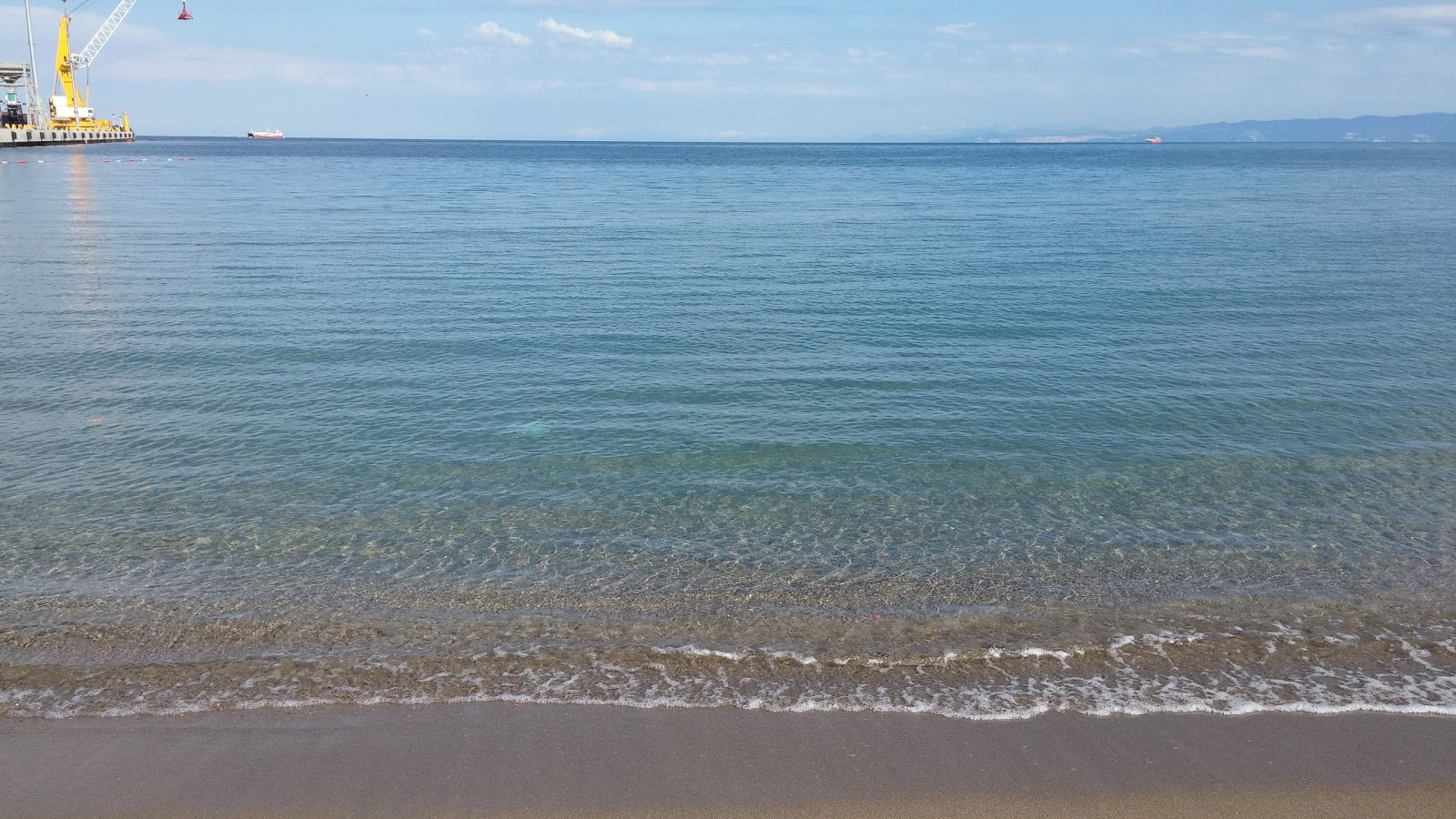 Φωτογραφία του Guldal Container beach - δημοφιλές μέρος μεταξύ λάτρεις της χαλάρωσης