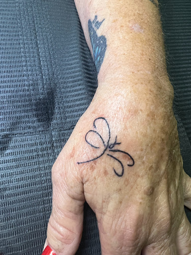 Explore filmmaker tattoo ideas, creative tattoo ideas in Melbourne, available at The Selfcare Trifecta