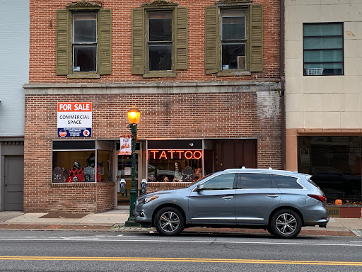 Explore two name tattoo ideas, creative tattoo ideas in Carlisle, available at Visual Addiction Tattoos