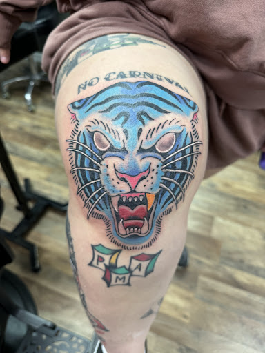 Find tattoo between breast ideas for your next unique tattoo in Vincennes at Silver Owl Tattoo