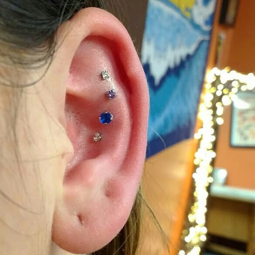 Explore mens rose tattoo ideas, creative tattoo ideas in Vancouver, available at Chaotic Good Body Piercing & Tattoo