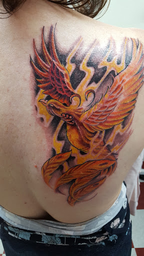 Explore ruby tattoo ideas, creative tattoo ideas in Denver, available at Fallen Owl Tattoo Studio