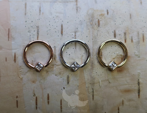 Explore cool small face tattoo ideas, creative tattoo ideas in Syracuse, available at Scarab Body Arts