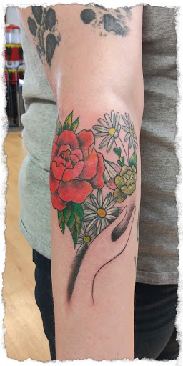 Explore hood tattoo ideas for men, creative tattoo ideas in La Crosse, available at La Crosse Tattoo