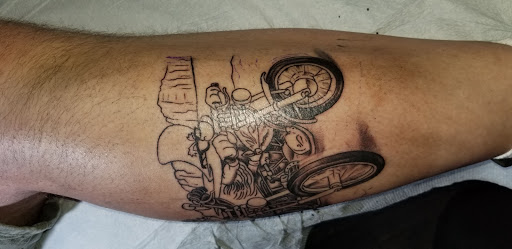 Explore black king tattoo ideas, creative tattoo ideas in Centralia, available at Lucky No.3 Tattoo Company