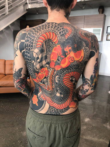 Find harley quinn tattoo ideas for your next unique tattoo in Saint Albans at 100 Candles Tattoo