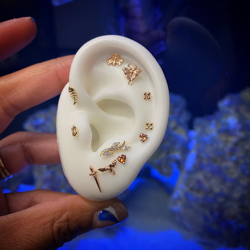 Explore up tattoo ideas, creative tattoo ideas in Cary, available at Fine Art Body Piercing By Lilith Mae