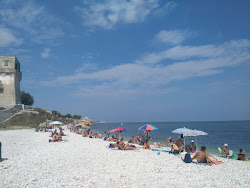 Foto von Spiaggia La Torretta und die siedlung