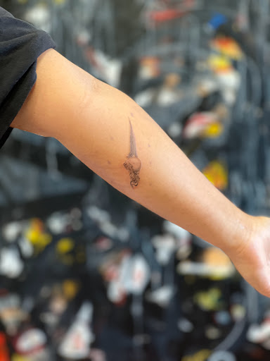 Explore tattoo ideas for losing a brother, creative tattoo ideas in Charlotte, available at Gilded Unicorn Tattoo Parlor