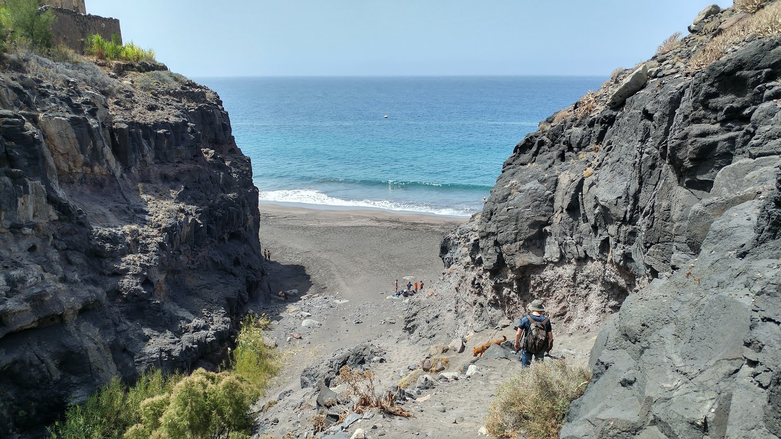 Photo of Playa de GuiGui surrounded by mountains