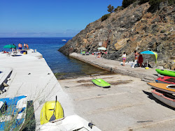 Foto von Spiaggia di Patresi und seine wunderschöne Landschaft