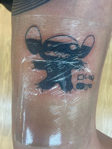 Explore tattoo flag ideas, creative tattoo ideas in Lahaina, available at Sweet Trade Tattoo