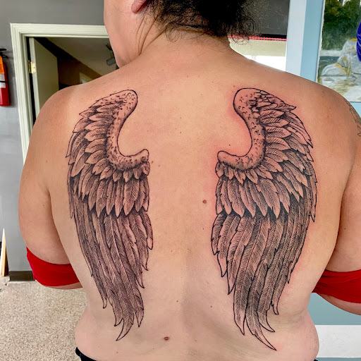 Explore singer tattoo ideas, creative tattoo ideas in Clarksville, available at Uncle Bobs Tattoos