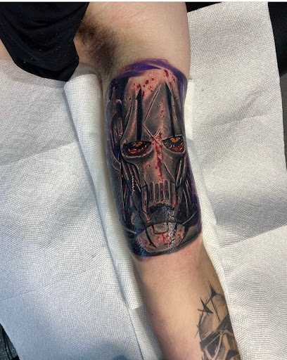 Explore street signs tattoo ideas, creative tattoo ideas in Conroe, available at Nicoles Tattoos and Piercings