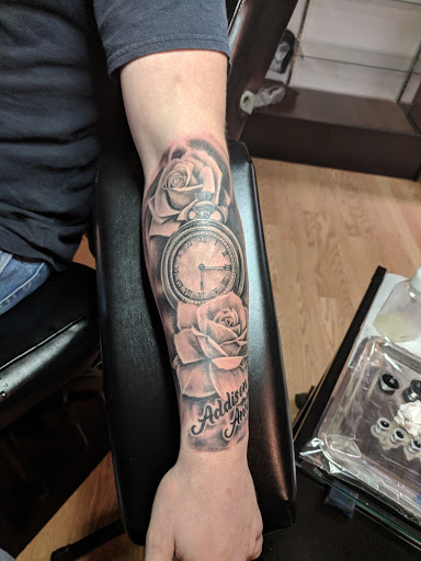 Explore 3 cross tattoo ideas, creative tattoo ideas in Butler, available at The Ink Vault