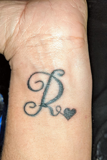 Explore heart tattoo ideas for men, creative tattoo ideas in Lafayette, available at Socro26