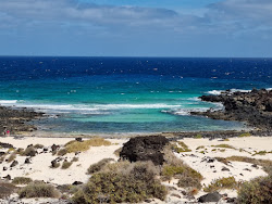 Playa de Caleta del Mero'in fotoğrafı - rahatlamayı sevenler arasında popüler bir yer