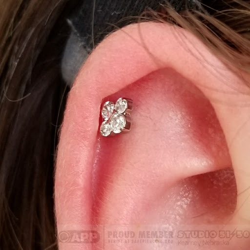 Explore small goth tattoo ideas, creative tattoo ideas in Kearney, available at Studio 5150 Piercing & Fine Jewelry