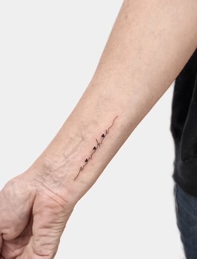Explore guitar pick tattoo ideas, creative tattoo ideas in Sunnyvale, available at Greego tattoo
