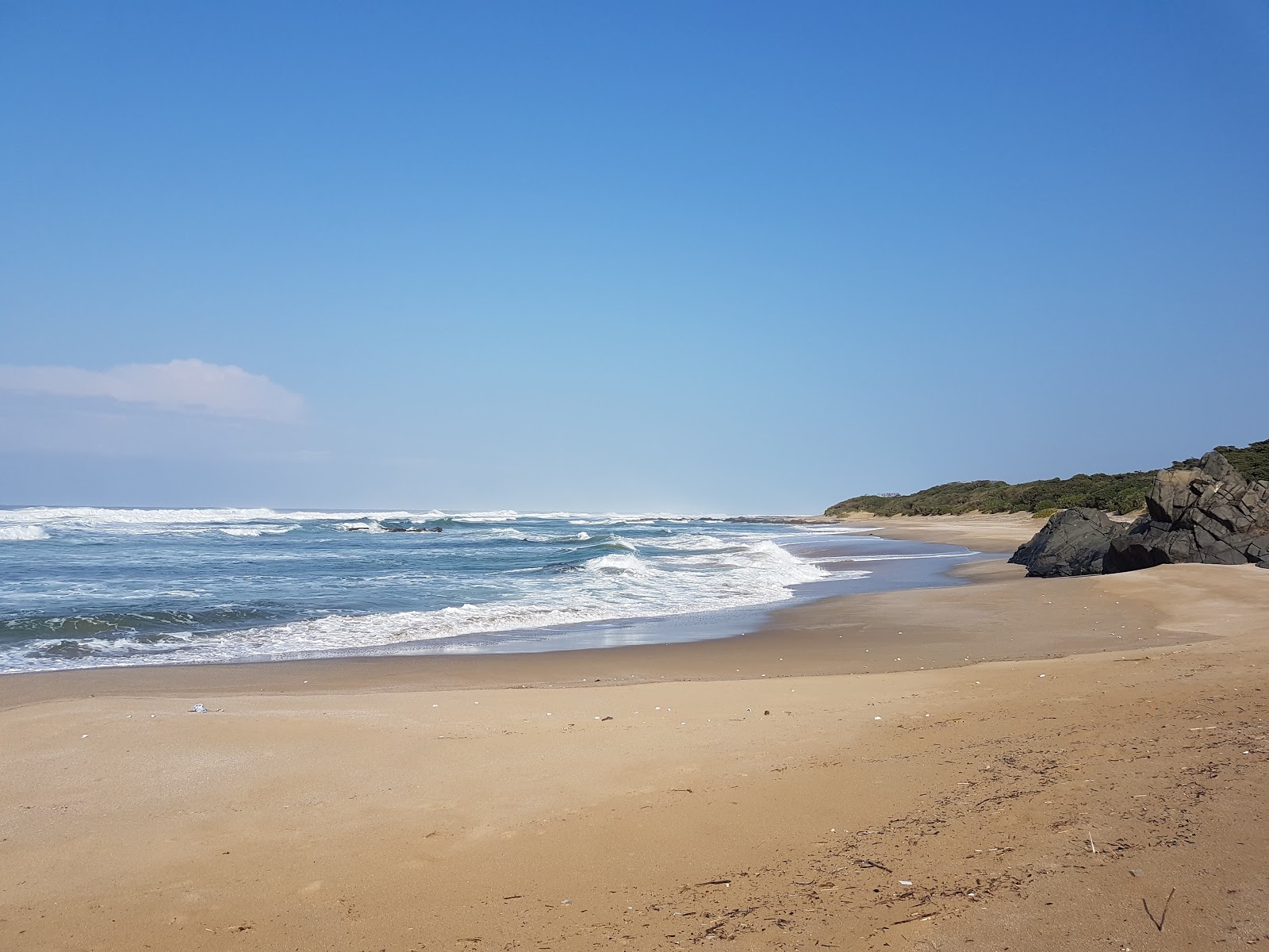 Xhora beach'in fotoğrafı parlak ince kum yüzey ile
