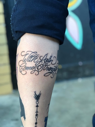 Explore cover up tattoo ideas on thigh, creative tattoo ideas in Morrow, available at The Inkers Parlour