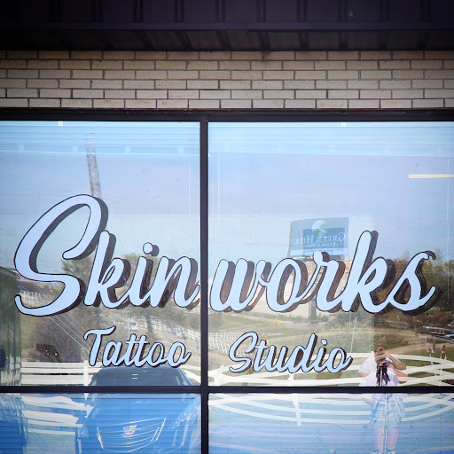 Explore small daisy tattoo ideas, creative tattoo ideas in Owasso, available at Skinworks Tattoo Studio